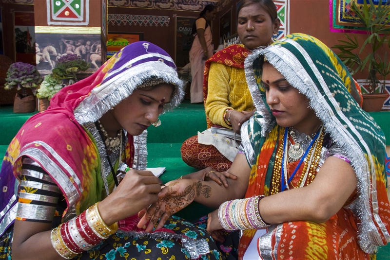Why us 1 Applying Mehandi JPEG